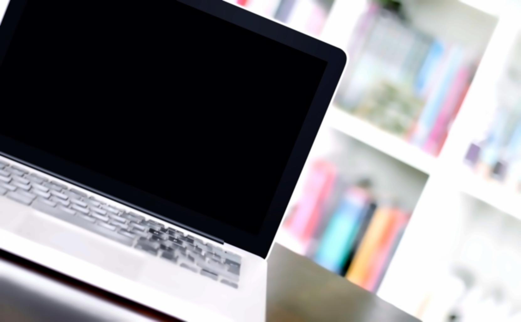 Students working on web development projects with clean code displays